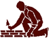 Picture of a man laying bricks to build a wall